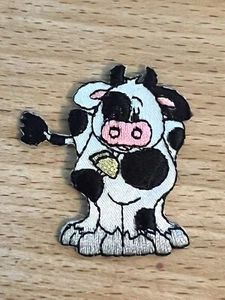 Cow Patch - 1 5/8 inches x 1 3/4 inches - Iron-on - Picture 1 of 2