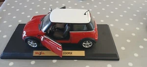 Maisto Red Mini Cooper in excellent condition on a stand - Picture 1 of 4