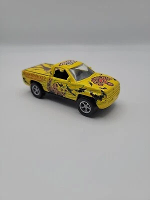 RACING CHAMPIONS 96 DODGE RAM, SCOOBY DOO 2, YELLOW 1:64 SCALE - Image 1 of 4