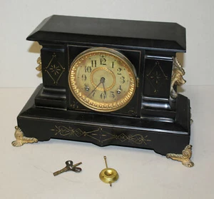 Antigua compañía de relojes de abrigo Ansonia - hierro fundido - Imagen 1 de 5