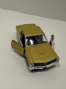 Welly Pontiac GTO goldgelb 1965 Maßstab Modellauto 1:24 22092 - Bild 1 von 11