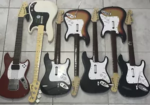 Lot Of 7 Rock Band Fender Stratocaster Wireless & Wired Guitar & Bass For Parts - Picture 1 of 6