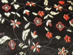 Fiori in tessuto broccato nero al metro - Foto 1 di 1