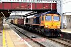 PHOTO  CLASS 66/7LE CO-CO NO.66 764 OF GBRF TRAVELLING THROUGH HARROW & WEALDSTO