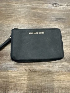 Gebrauchte Michael Kors Handgelenktasche schwarz-weiß - Bild 1 von 19