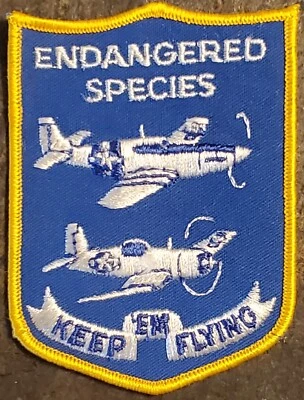 Vtg Endangered Species Keep ‘Em Flying Military Airplanes Sew-On Patch COLOR ORG - Image 1 of 2