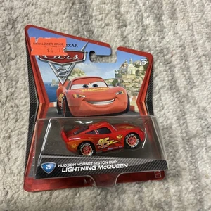 Disney Pixar Cars 2 Hudson Hornet Piston Cup Lightning McQueen #26 NEW!  - Picture 1 of 2