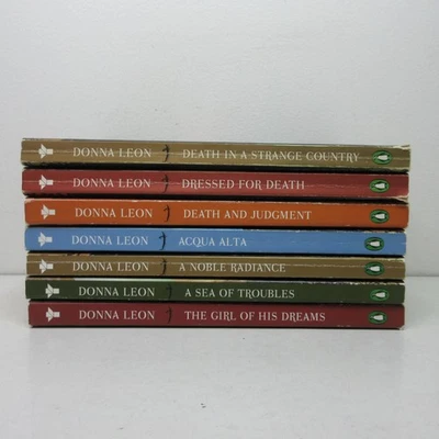 Lot of 7 Commissario Brunetti Mystery Series Paperback Books by Donna Leon - Image 1 of 4