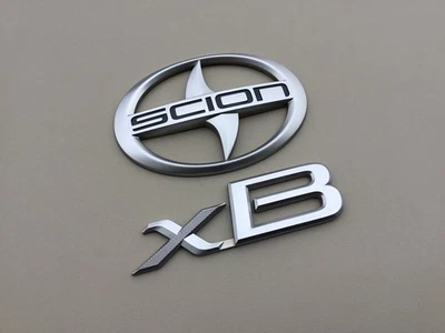 2004-2006 Scion XB Liftgate Emblem Set Tailgate Logo Badge OEM - Image 1 of 4