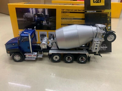 Cat CT660 Day Cab Tractor With Mcneilus Bridgemaster Mixer Diecast Masters 1/50 - Image 1 of 4