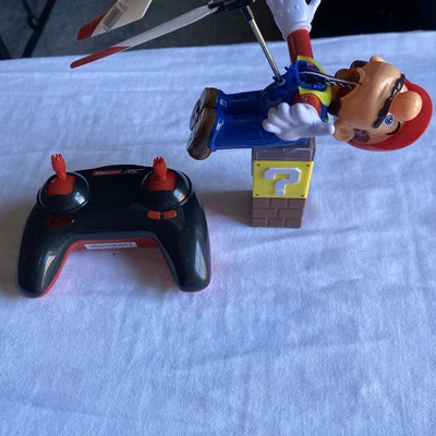 Toy Super Mario Flying Cape Mario Carrera RC Helicopter 2.4 GHz. FOR PARTS - Image 1 of 4