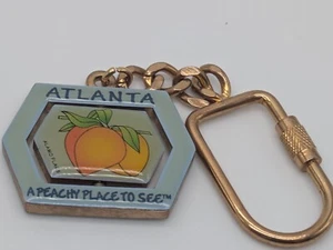 "A Peachy Place to See" Atlanta Georgia Souvenir Spinner Keychain Accessory - Picture 1 of 5