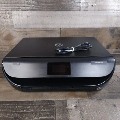 Impresora de inyección de tinta inalámbrica todo en uno HP ENVY 5055 7932 páginas probada Foto 1 de 4