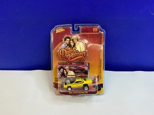JOHNNY LIGHTNING 1/64 THE DUKES OF HAZZARD DAISY'S PLYMOUTH ROAD RUNNER - Picture 1 of 8
