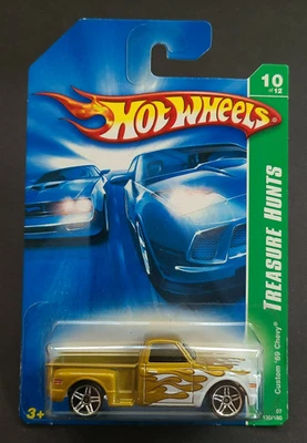 Chevy Hot Wheels Treasure Hunts Custom '69 2006, dorado, número de coleccionista 130 Foto 1 de 4