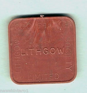 #D275. LITHGOW CO-OP. BREAD HALF LOAF PLASTIC TOKEN - Picture 1 of 2