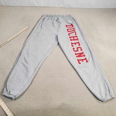 Pantalones deportivos de tejido inverso Duchesne Champion de colección para hombre gris medio rojo deletreado Foto 1 de 4