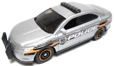2010 MATCHBOX FORD INTERCEPTOR 70TH ANNIV SILVER 1:70 DIECAST 2 7/8" POLICE CAR - Image 1 of 4