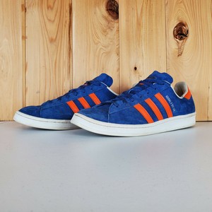 blue and white adidas high tops