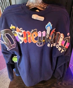 Maglia Disneyland 2025 Glow In The Dark Blue Villains Spirit taglia GRANDE nuova 2025 - Foto 1 di 2