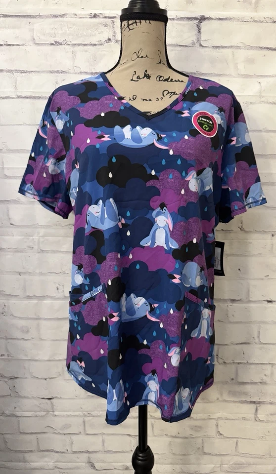 Disney Size Large Eeyore Rain V Neck Scrub Top Winnie The Pooh Purple Blue New - Image 1 of 4