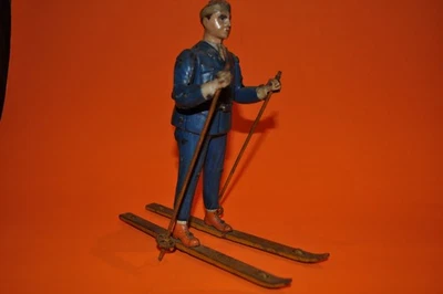 Raro "SKI ROLF" LEHMANN ESTAÑO WINDUP ESQUIADOR ALEMANIA 1920 EX Foto 1 de 4