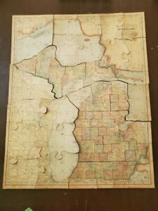 vintage puzzle map of Michigan very old