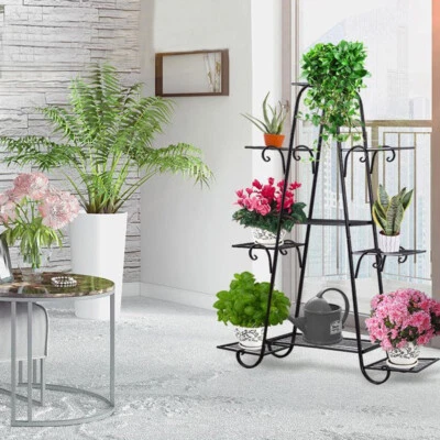 Soporte para plantas de metal de hierro forjado negro con capacidad para 9 macetas de interior y exterior Foto 1 de 4