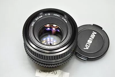 MINOLTA MD 50mm 1:2 PRIME LENS WITH CAPS - Image 1 of 2