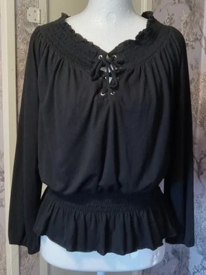 Top negro estilo boho manga larga pequeño Foto 1 de 4