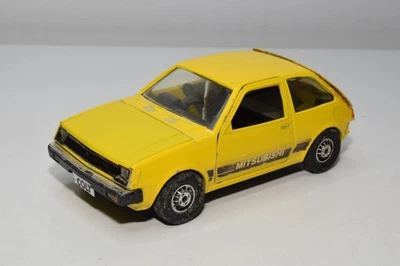 B74 1:25 MITSUBISHI MOTORS MIRAGE MITSUBISHI COLT GIALLO BUONE CONDIZIONI. - Immagine 1 di 4