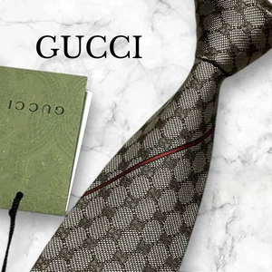 Corbata Gucci Cuello Nueva y Sin Usar Marrón GG Cuadros Línea Jerez 100% Seda Hecha en Italia - Imagen 1 de 3