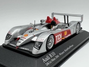 MINICHAMPS 1:43 AUDI R10 TDI WINNER 24H LE MANS 2006 #8 400 061608 - Foto 1 di 7