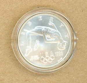 1996 D Atlanta Olympics High Jump UNC Commemorative 90% Silver Dollar Coin - Picture 1 of 2