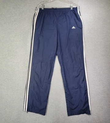 Pantalones de chándal Adidas para hombre medianos azul marino a rayas forrados de malla al tobillo cremallera logotipo recto Foto 1 de 4