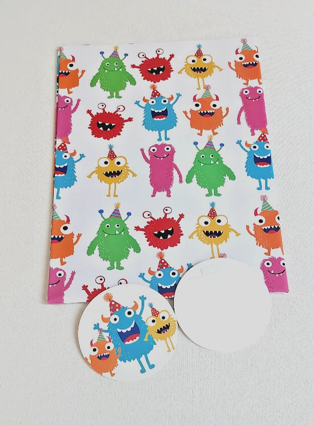 2 SHEETS of MONSTERS GIFT WRAP & 2 Round STICK ON TAGS ANY OCCASION BRIGHT - Image 1 of 1