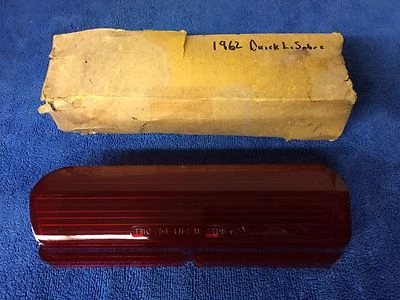 Lente de luz trasera derecha Buick LeSabre Invicta 62 TMC-754 "NOS" Foto 1 de 4