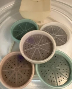 Juego de 5 posavasos de bebida pastel con rueda de vagón Tupperware vintage - Imagen 1 de 11