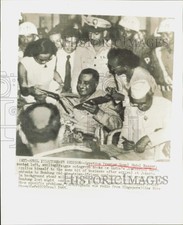 1955 Press Photo Egypt's Gamal Abdel Nasser signs autographs in Jakarta.