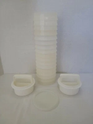 22 PIECE LOT OF VINTAGE TUPPERWARE HAMBURGER (2) PRESSES (17) KEEPERS (1) LID  - Image 1 of 4