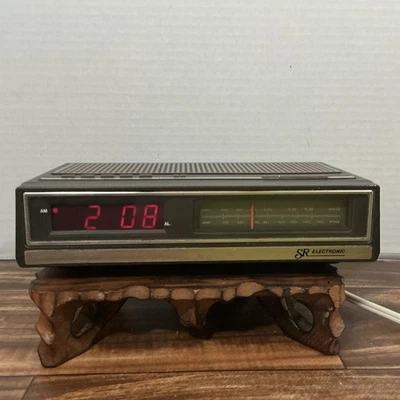 Vintage SR Electronics Sears AM/FM Clock Radio No. 317.23210 250 Faux Woodgrain - Image 1 of 4