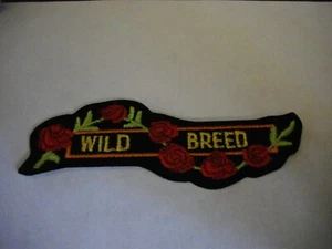 PATCH WILD BREED Iron On or SEW ON PATCH MOTORCYCLE LADY RIDER 3 3/4" x 1 1/2" - Picture 1 of 2