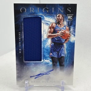 2024-25 Panini Origins Ariel Hukporti Rookie Patch Auto #RJA-AKK - Picture 1 of 6