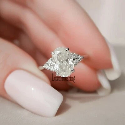 925 Sterling Silver 3.00 Ct White Oval Cut Moissanite Cluster Engagement Ring 7  - Image 1 of 4