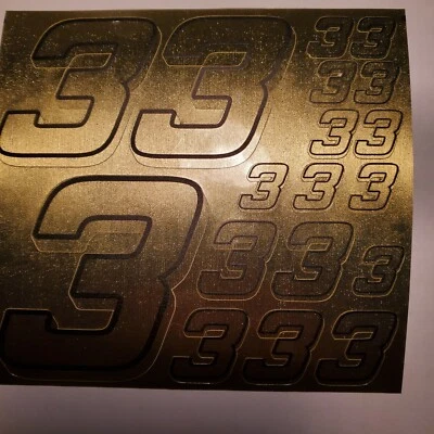 Hoja de calcomanías de vinilo dorado cepillado con números de carreras negros #3 1/10-1/12  Foto 1 de 4