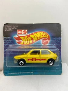 Hot Wheels LEO INDIA FIAT WALT DISNEY WORLD YELLOW W/ RED WRITING - Picture 1 of 4