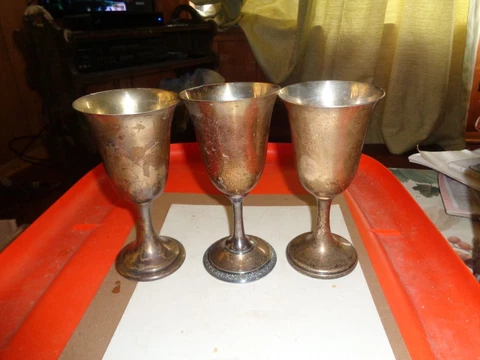 house salvage of metal antique cups Cover