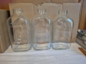Set of 3 /64 fl. oz. clear glass milk jugs (No Lids) 2 the same 3rd different - Picture 1 of 24