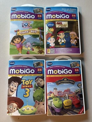 VTech MobiGo Lot of 4 Games Dora Toy Story 3 Jake Pirates Chuggington - Image 1 of 2