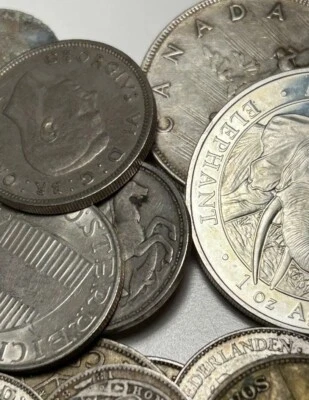 TopSeller 2 oz std 57g silver net content world coins&US random below melt value - Image 1 of 4